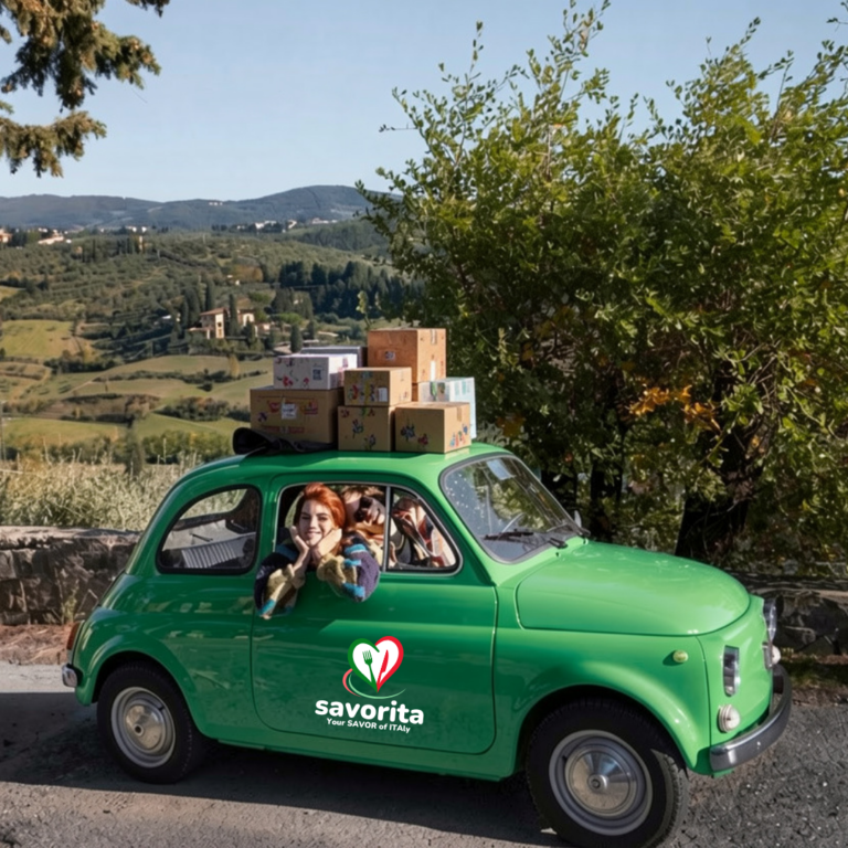 Green Fiat 500 loaded with savorita boxes in an Italian street